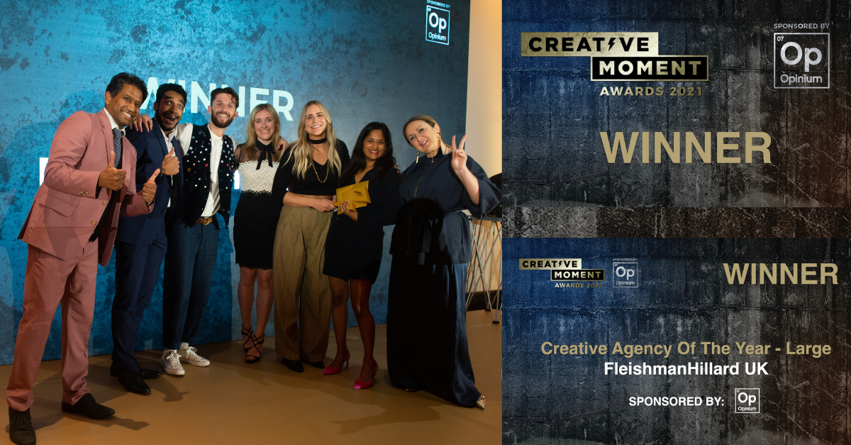 Members of FleishmanHillard UK collecting a trophy at the Creative Moment Awards 2021