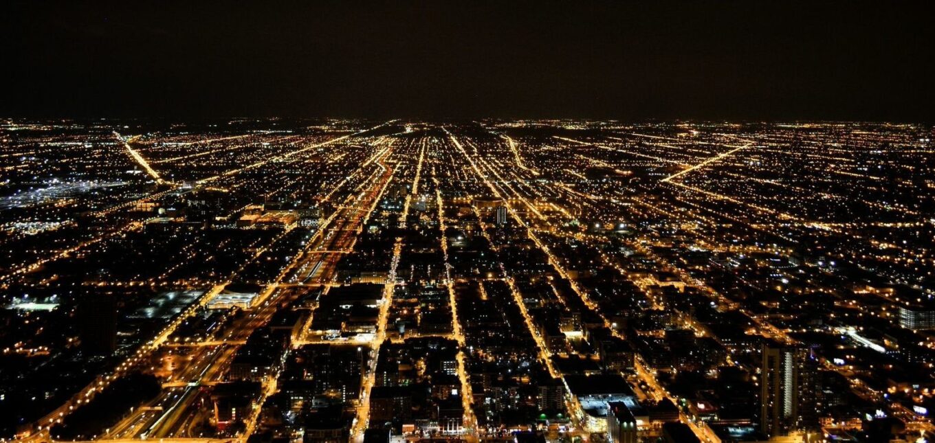 Illuminated city landscape at night